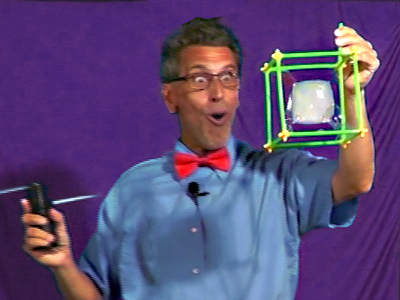 Picture of a man holding a Square Bubble with an excited appearance