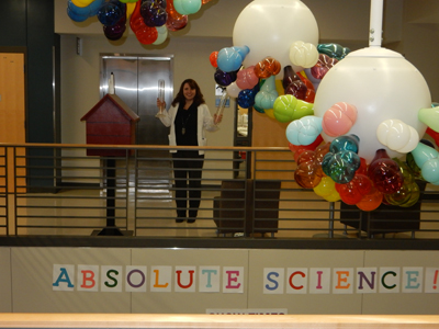 Static electricity experiment with balloons and light fixtures